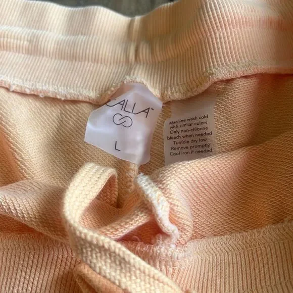 Calia Journey Collection High-rise Shorts for women in color orange/peach - Picture 2 of 5